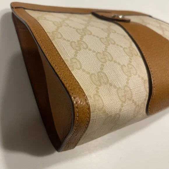 Gucci pvc/leather clutch